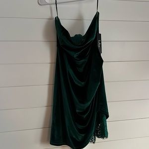 Emerald green velvet mini dress.
